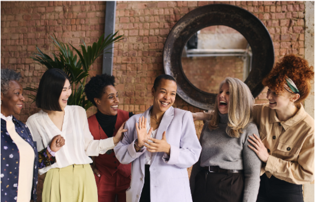 Women laughing together in workplace